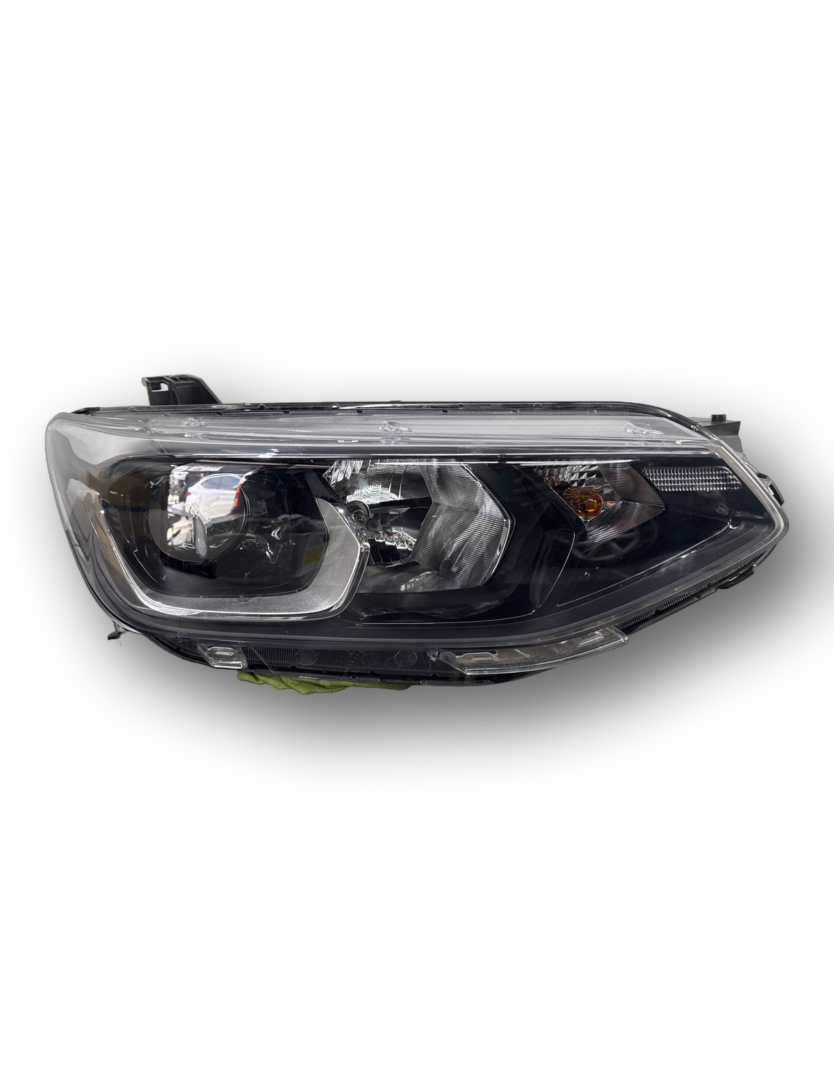 Farol LD Origina Chevrolet Tracker 2020 2024 detalhe